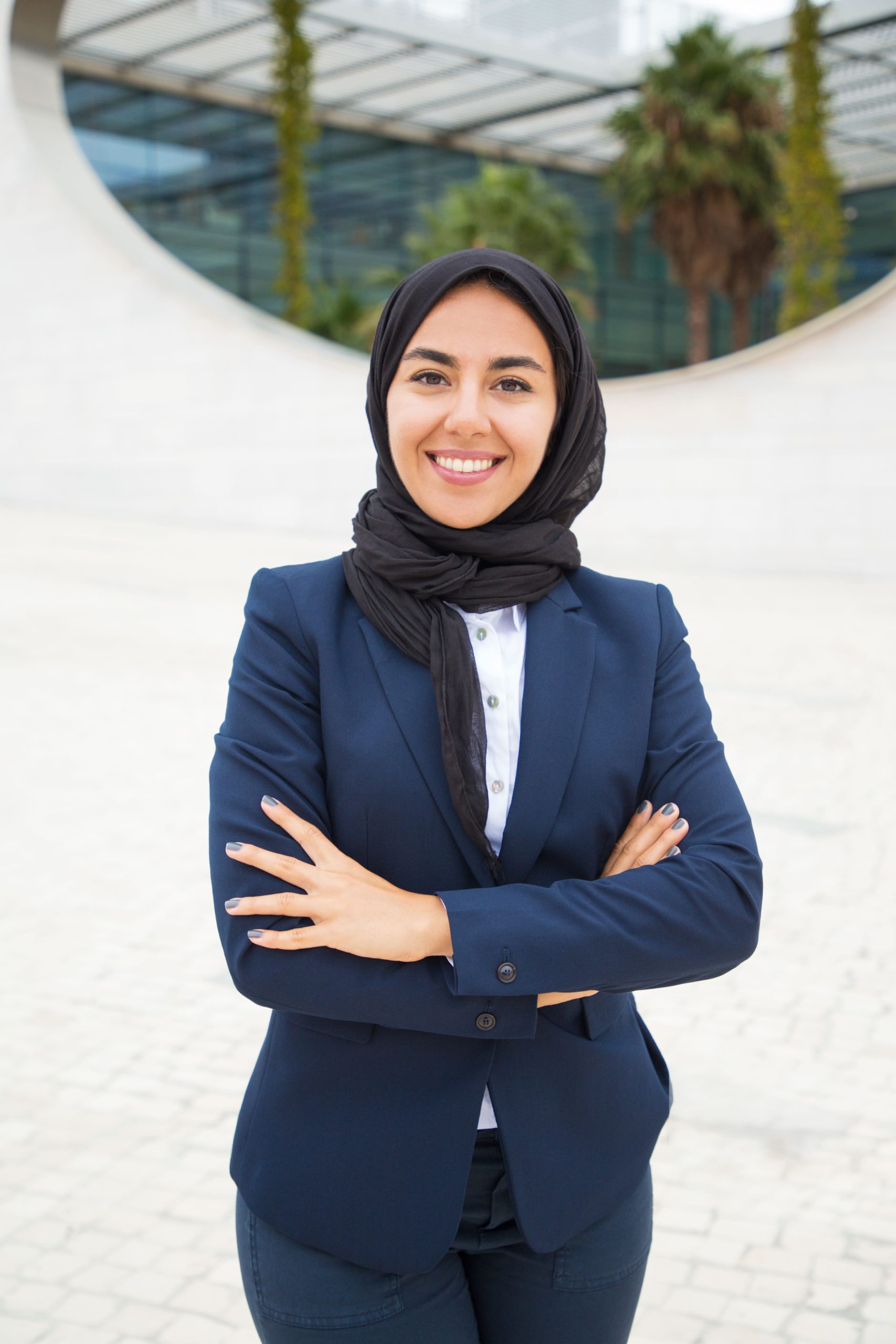 happy-successful-muslim-businesswoman-posing-outside (1)